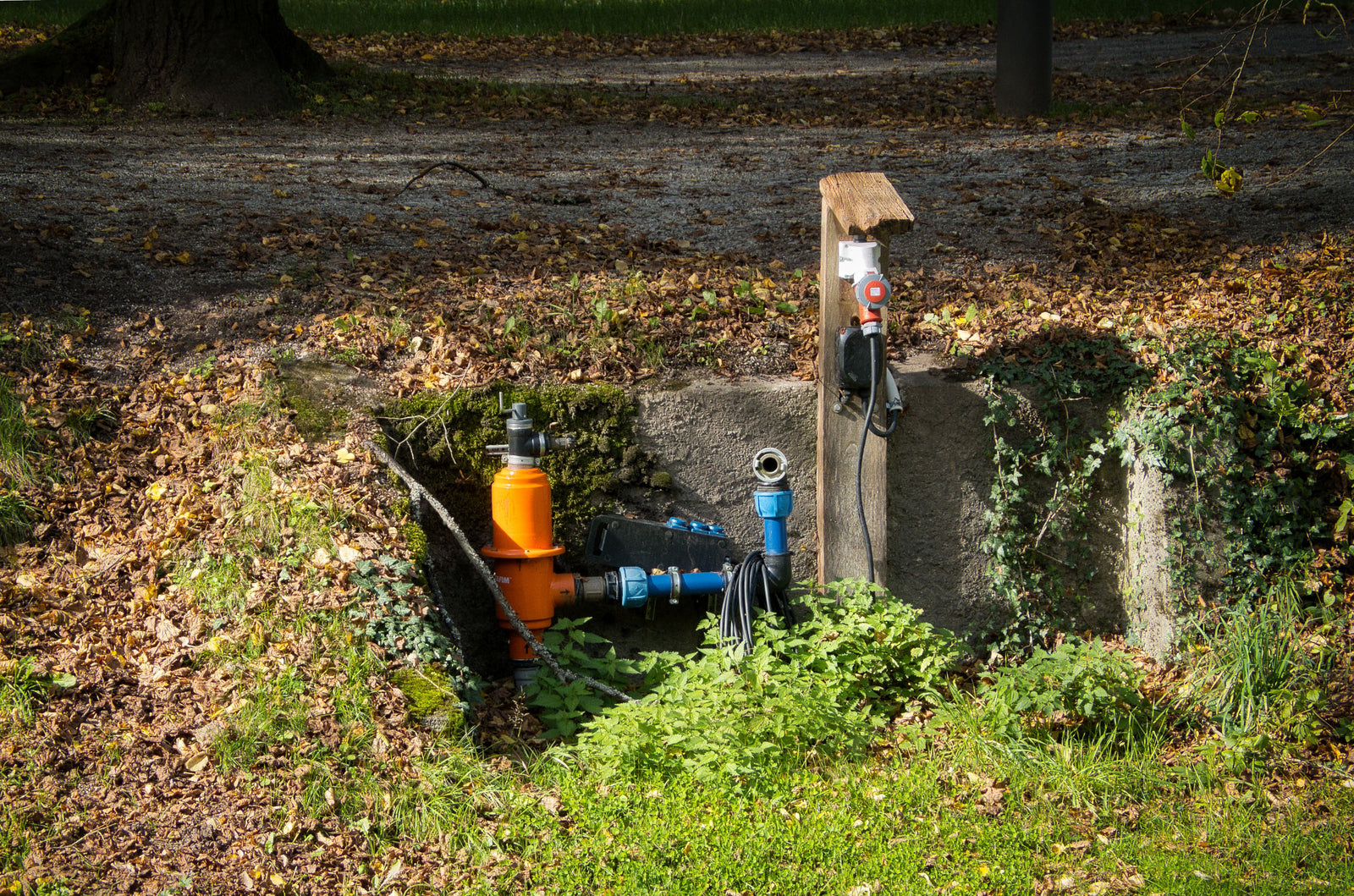 PP-aanboorzadel op beregeningsleiding in de tuin